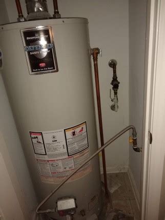 water heater leaking from overflow pipe|Why A Water Heater Leaks From The Overflow Pipe (Explained)